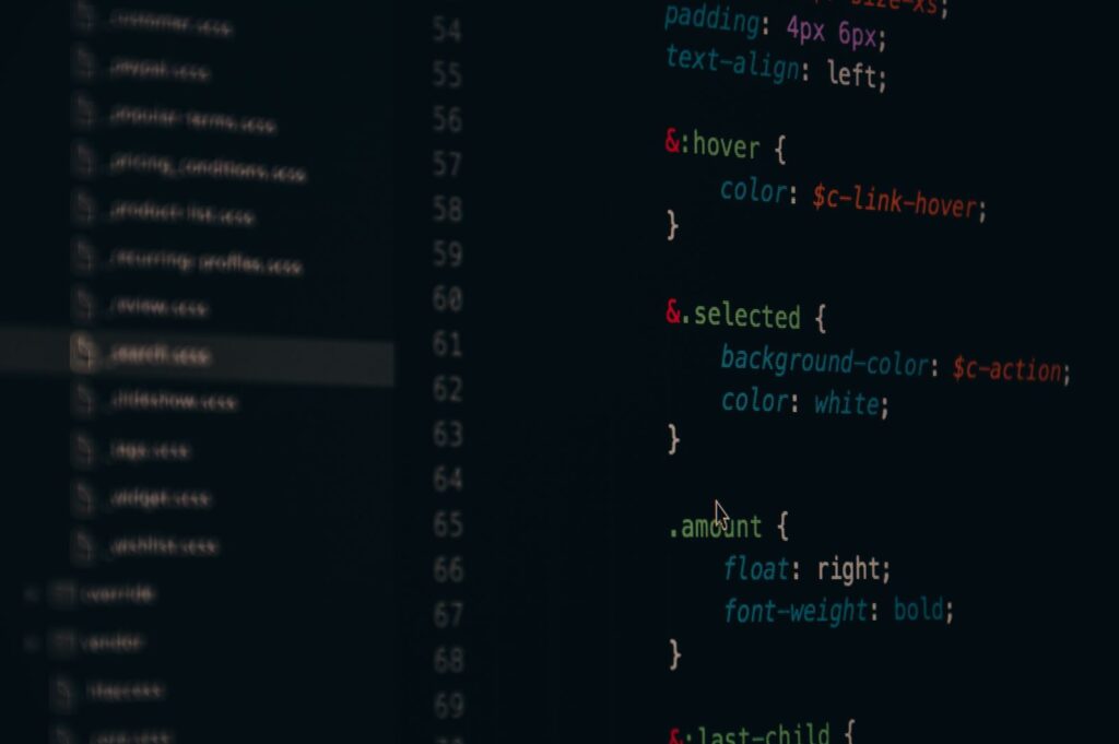 Stylesheet code glowing on a dark editor screen